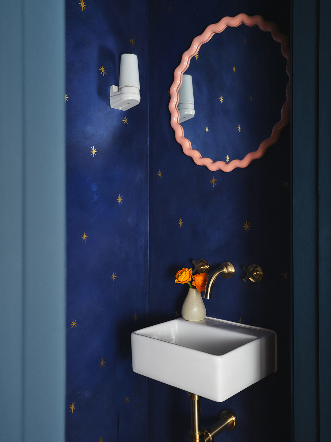 blue bathroom with stars on walls