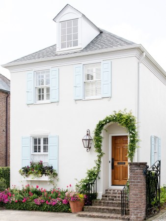 house with wreath around archway