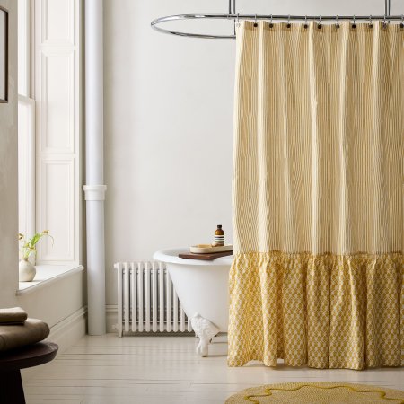  yellow striped and ruffled shower curtain