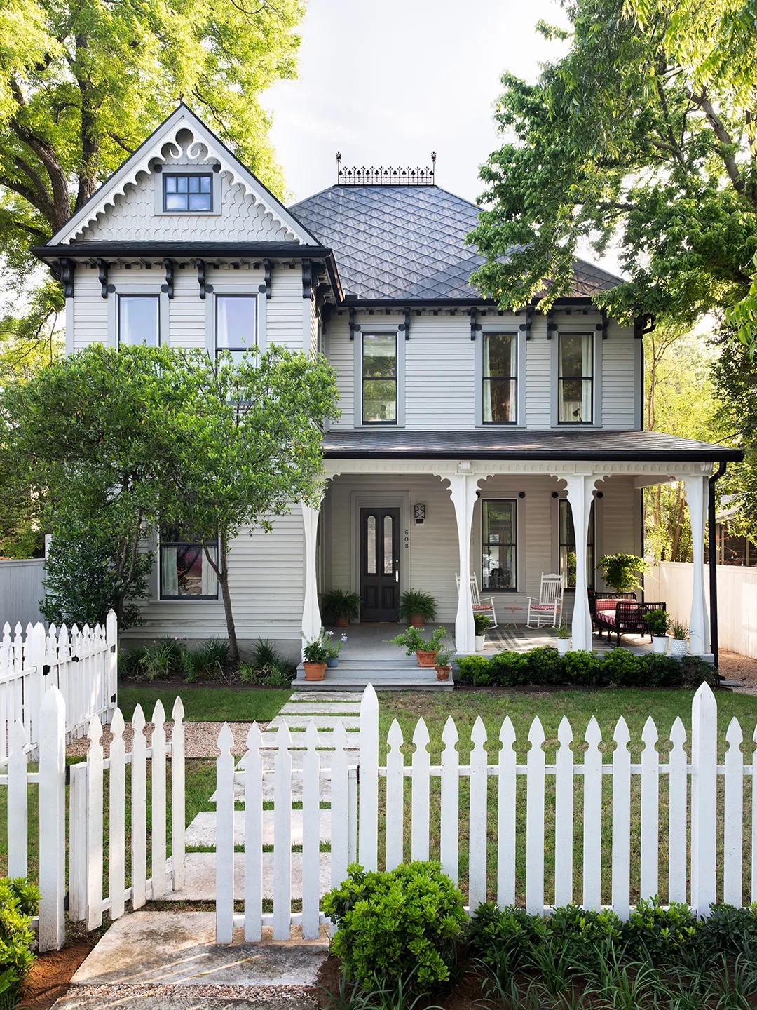 victorian house with picket fence