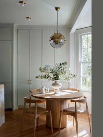 Breakfast nook with green walls