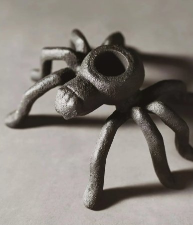  taper candle holder shaped like a spider