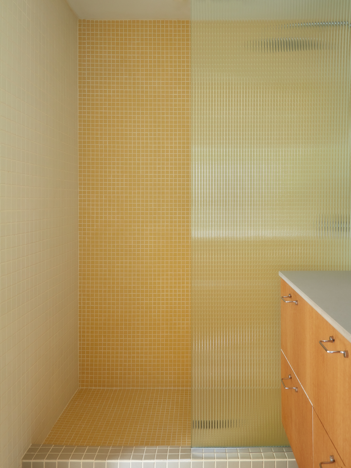 yellow tiled bathroom