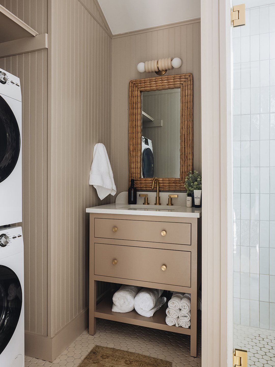 vanity next to washer-dryer