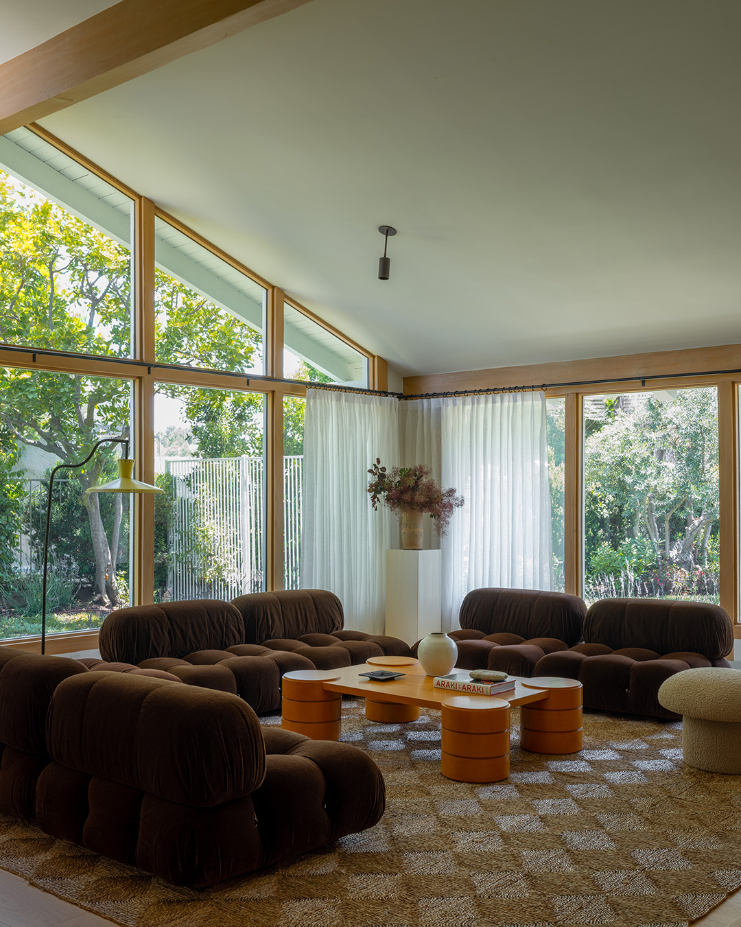 living room with brown sofas