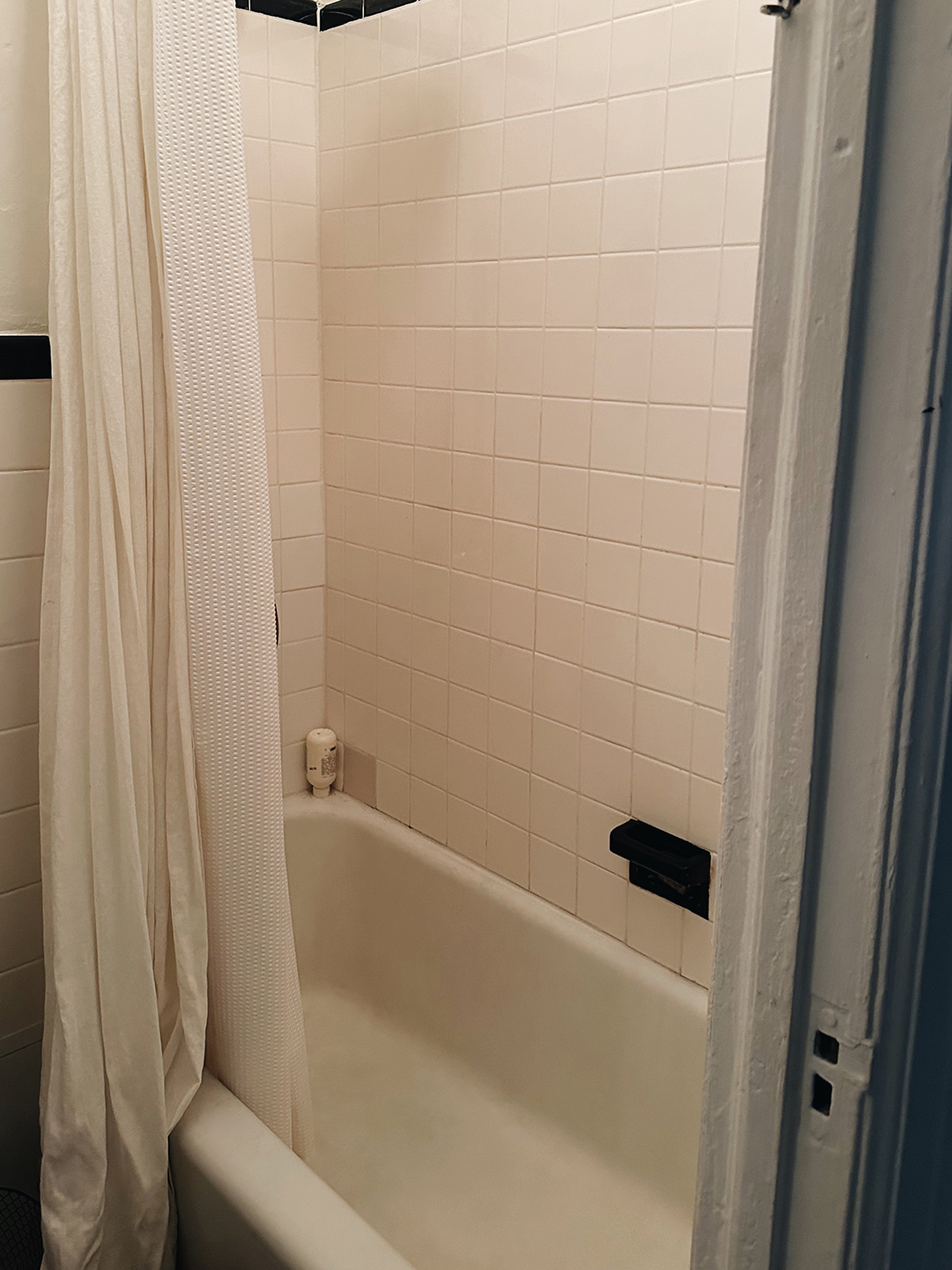 white shower tile