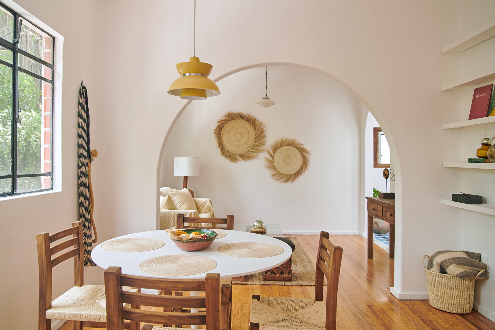 dining room with round table and wooden chairs