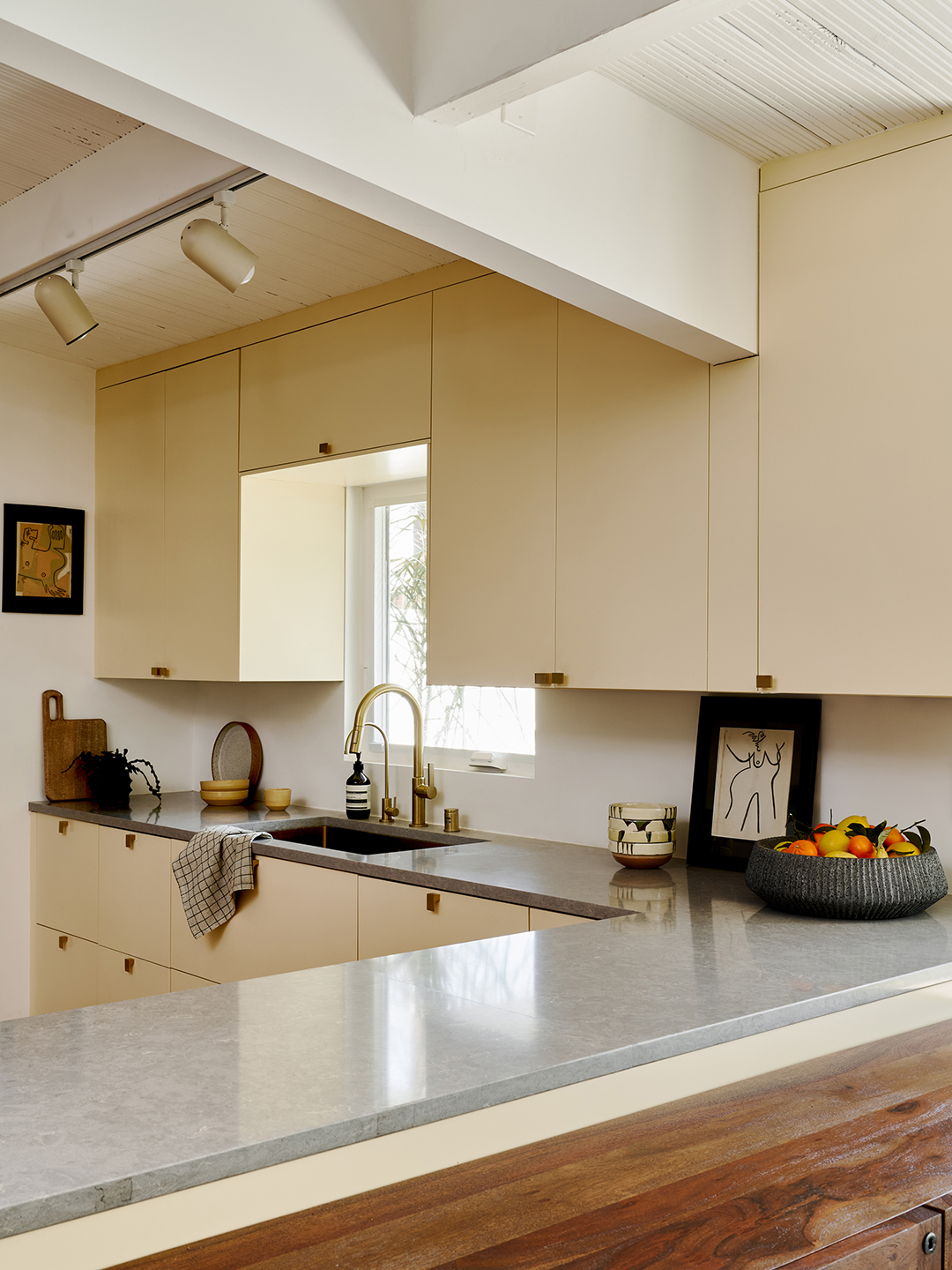 Butter yellow kitchen cabinetry