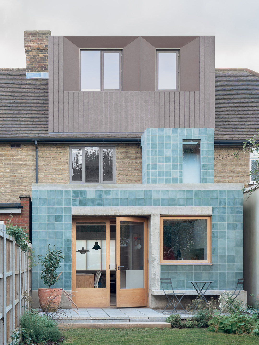 blue and brick tiled house