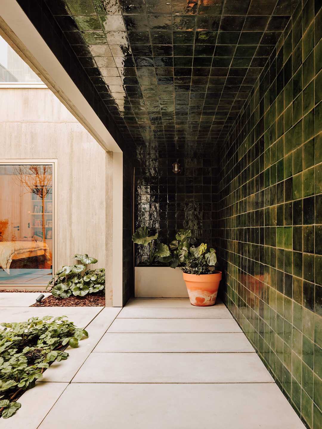 dark green tiled covered patio