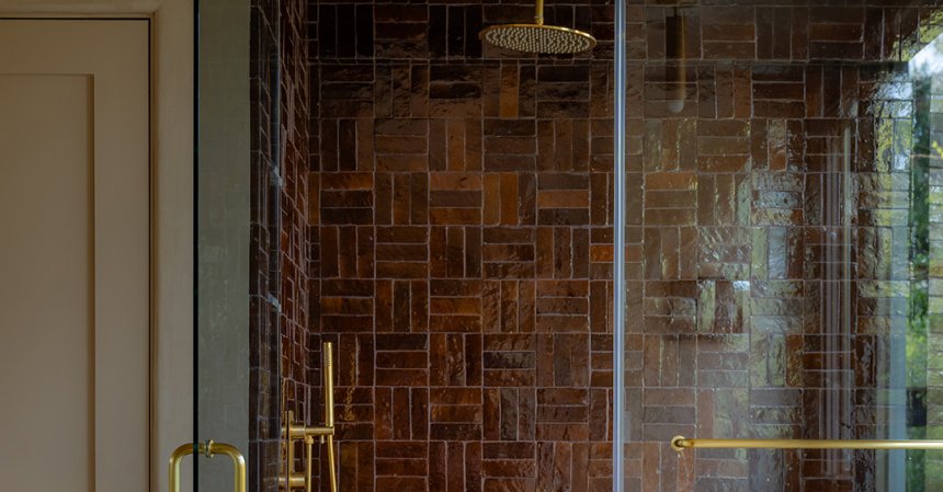 Brown basketweave tile in a shower