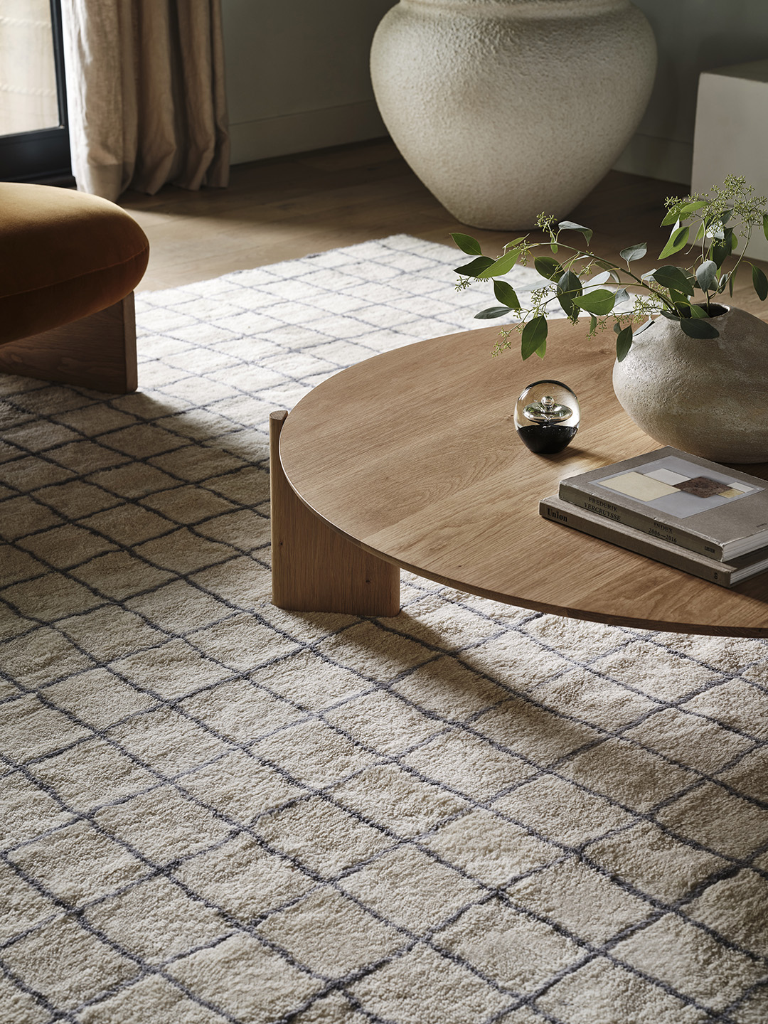 grid rug under a table