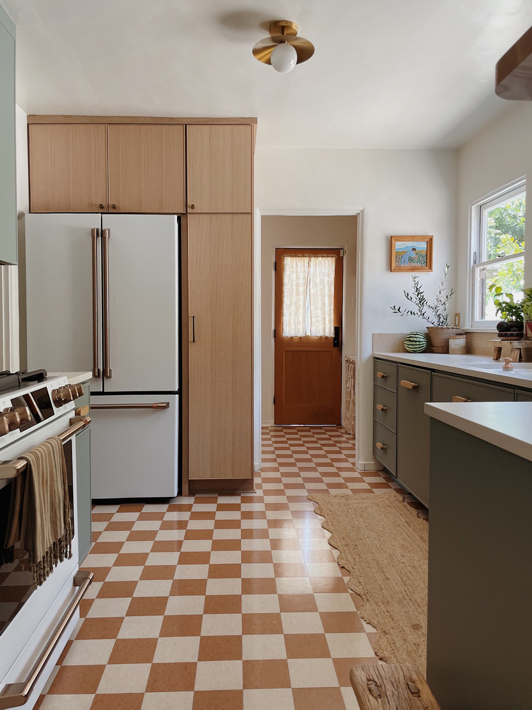 fridge with wood cabinets