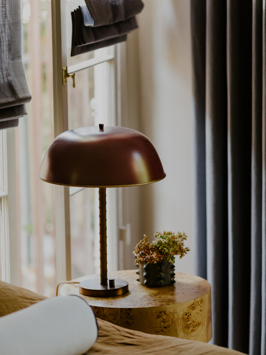 red lamp on nightstand