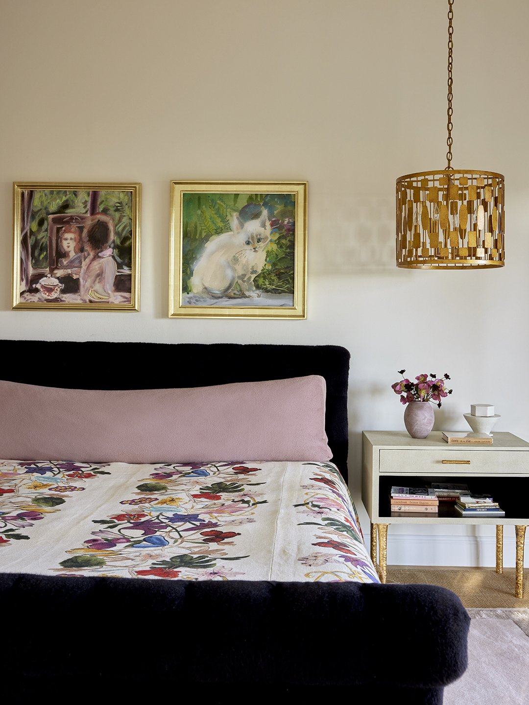 dark black bed with floral bedding