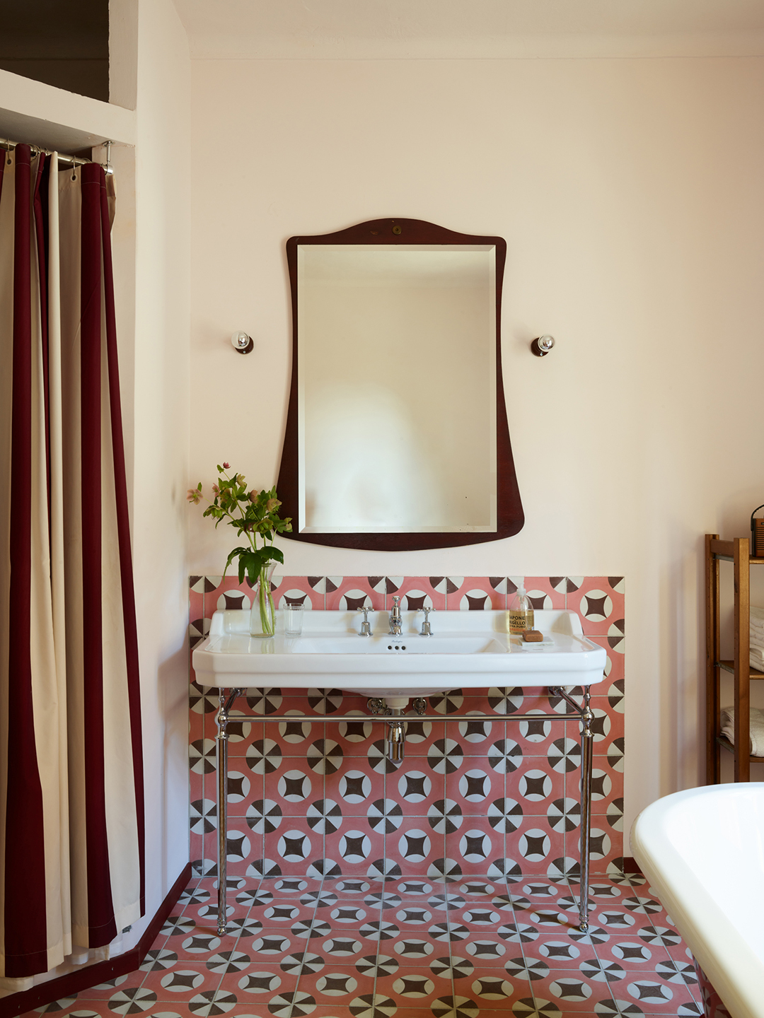 pink tile behind sink