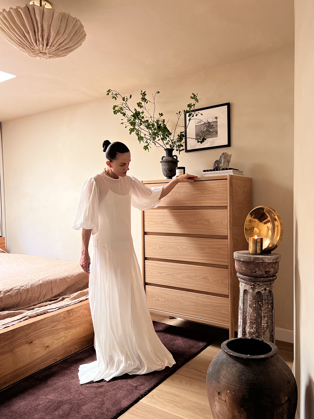 woman in white dress in bedroom