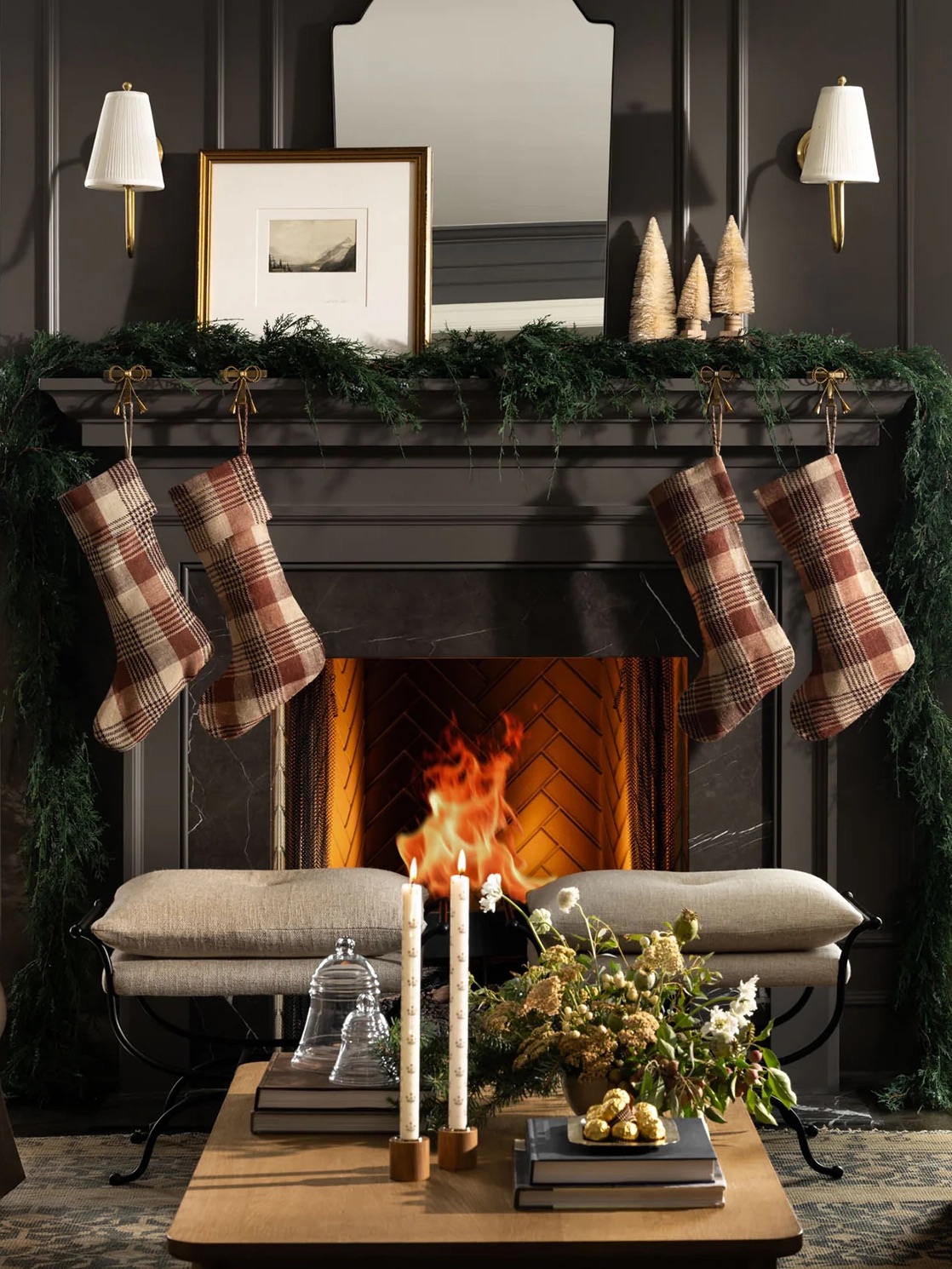 black fireplace with brown plaid stockings