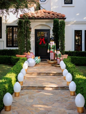 Inflatable nutcracker decoration on front lawn