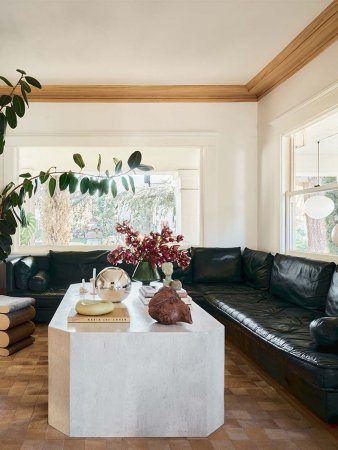 Living room with L-shaped leather sofa