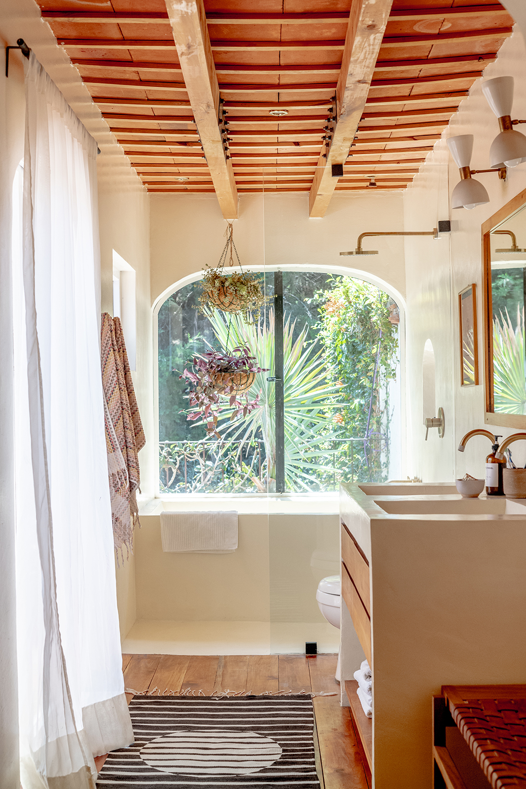 bathroom with wood beam ceiling