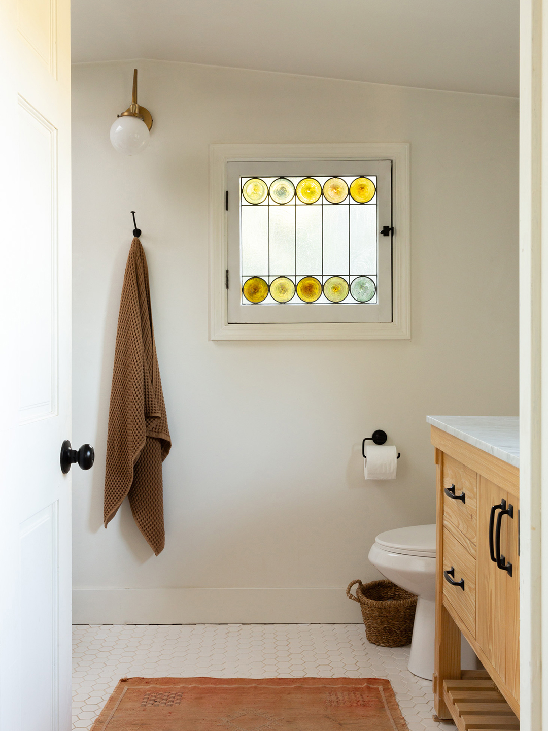 stained glass window in bathroom