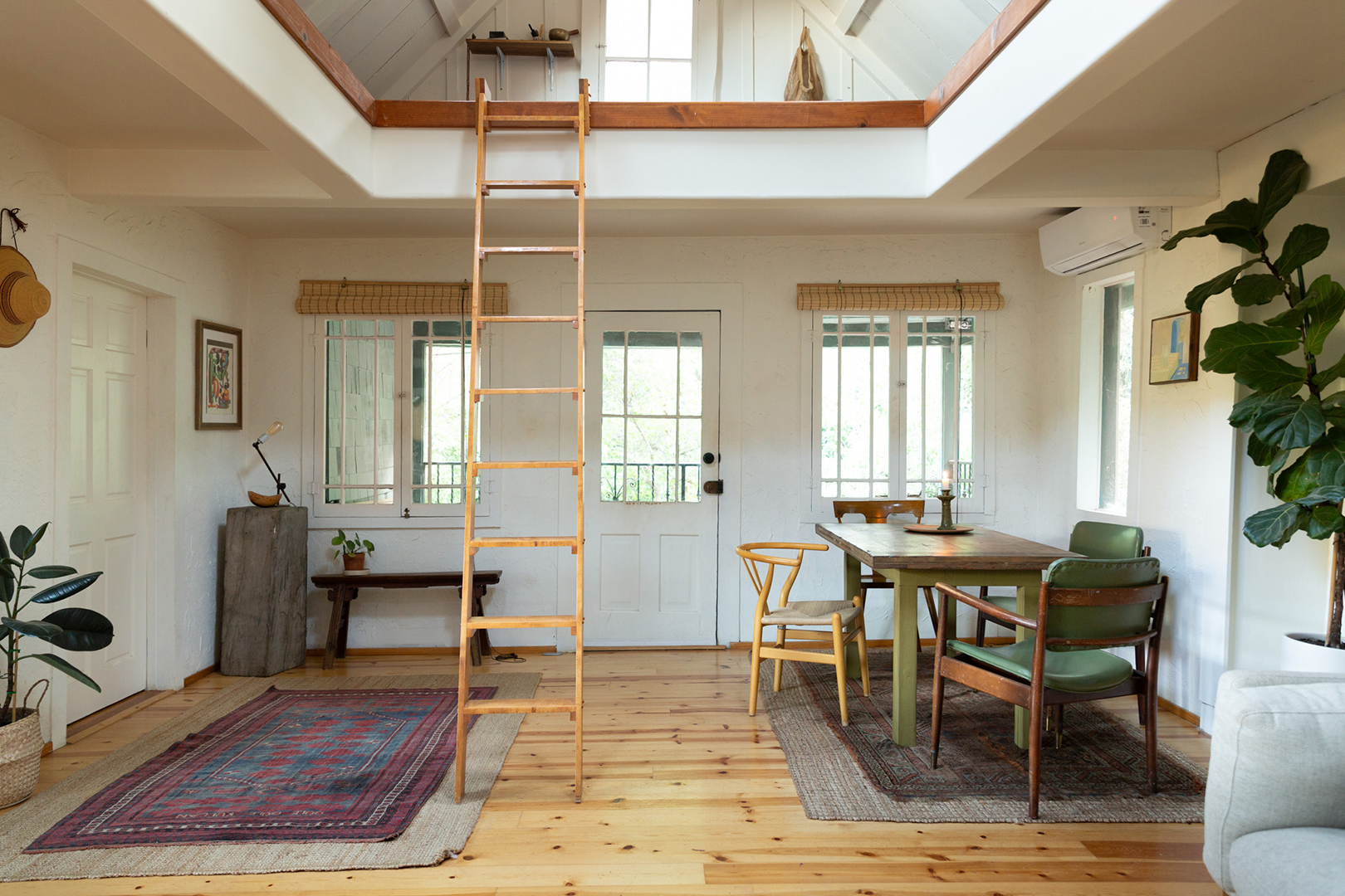 ladder leading to elevated loft