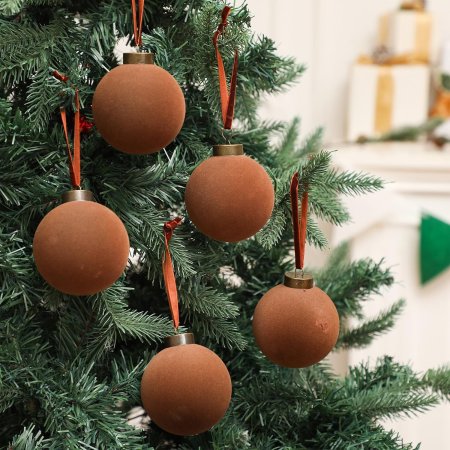  brown flocked ball ornaments on tree