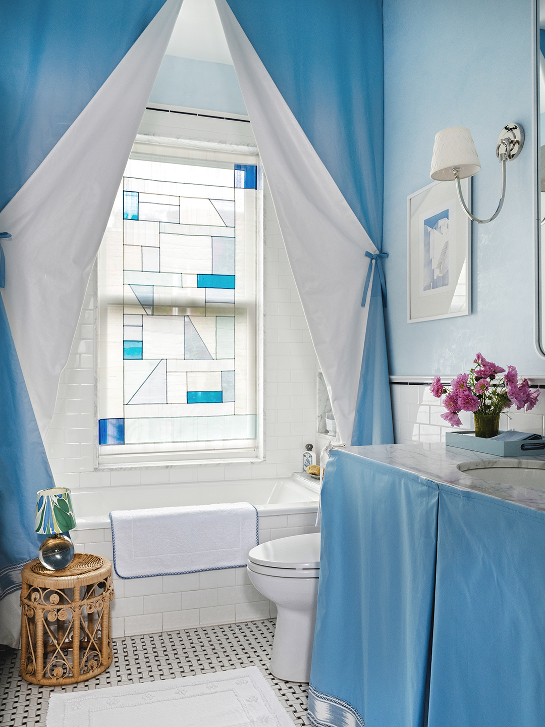 Blue bathroom with skirted sink