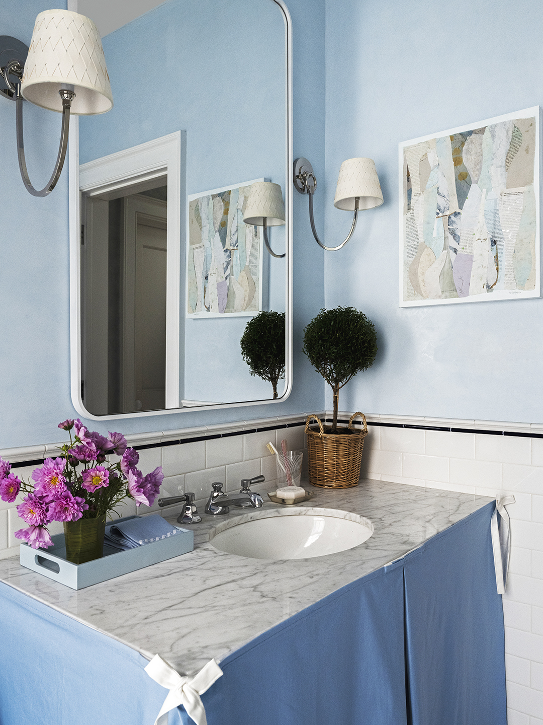 Blue bathroom with skirted sink