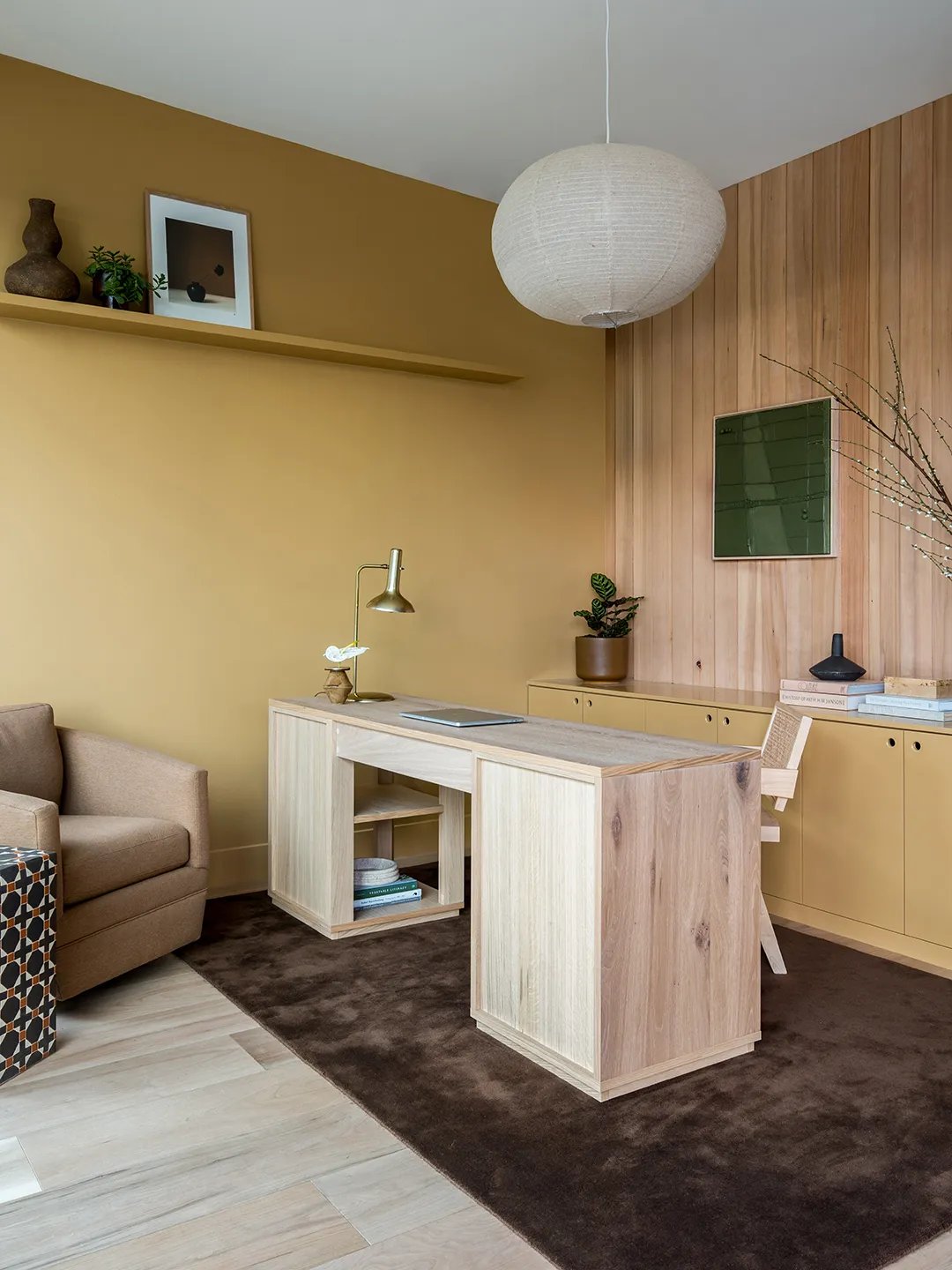 yellow office with brown rug