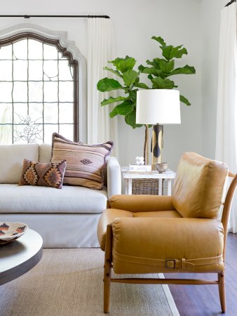 gray sofa and leather armchair