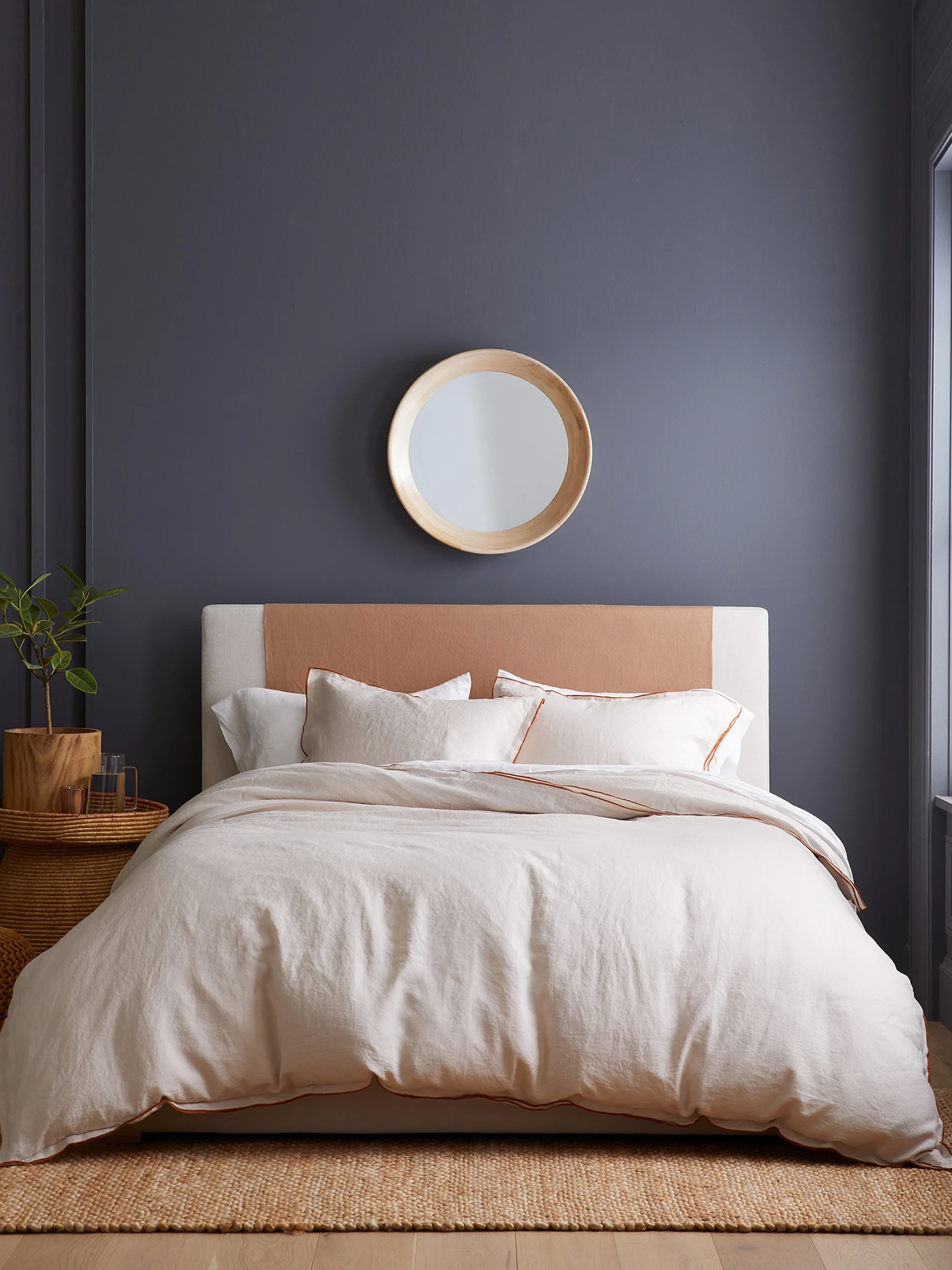 white bed in black bedroom