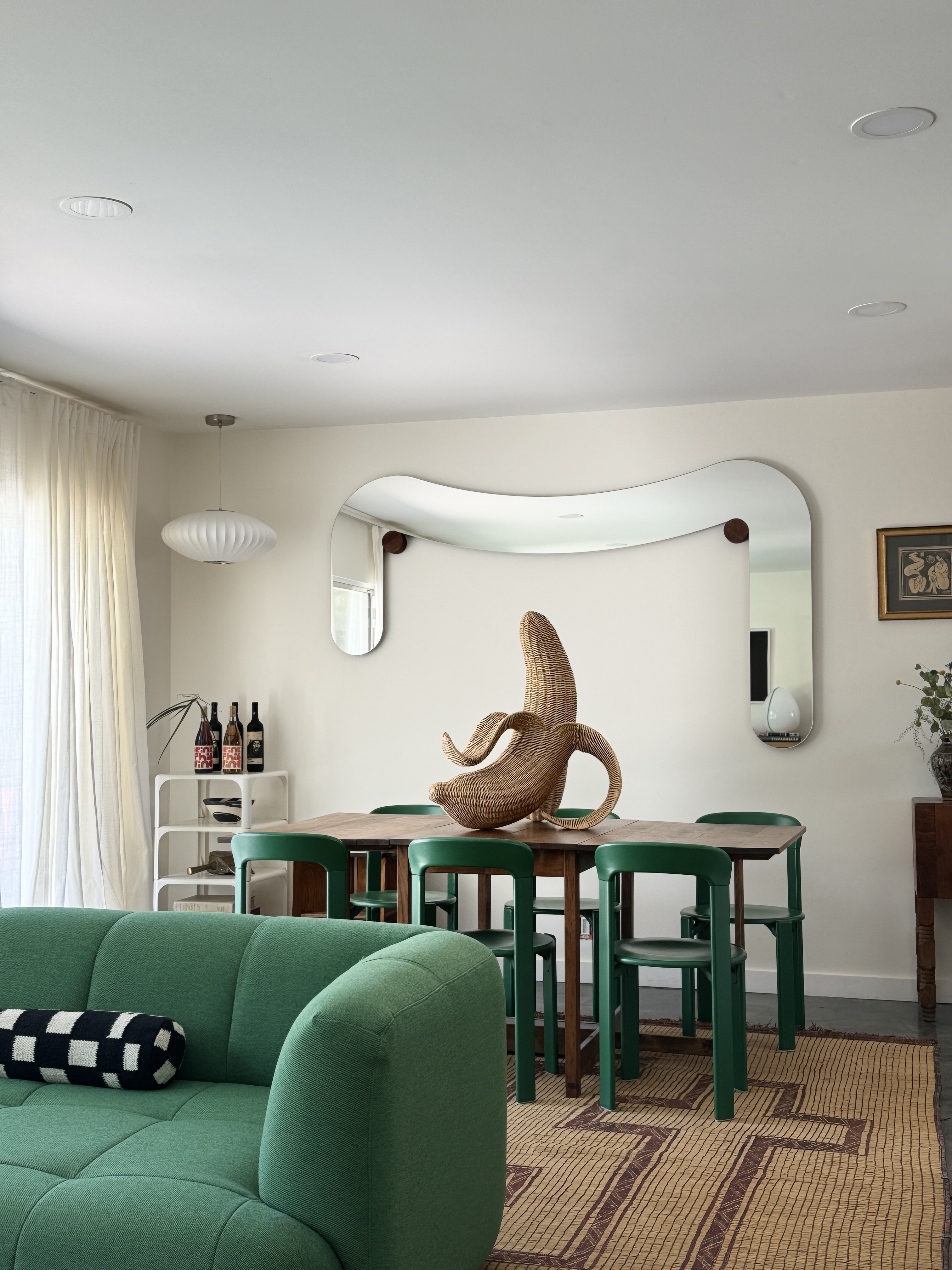 Dining room with green chairs