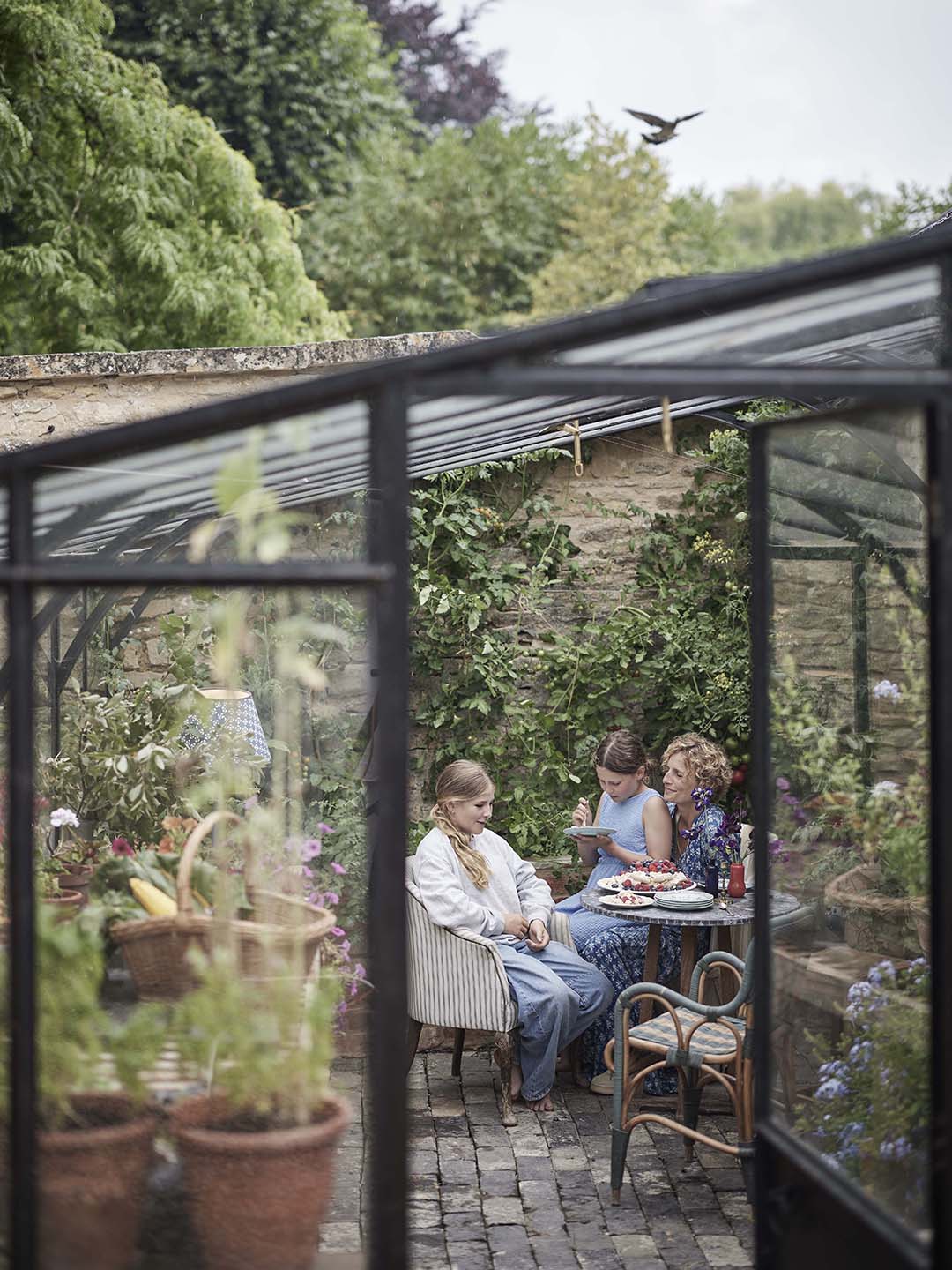 family in greenhouse