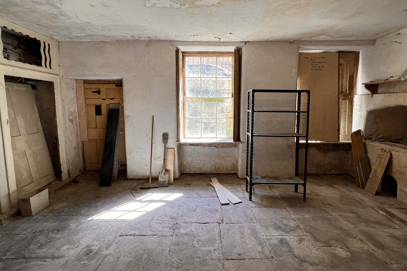 The kitchen's wall of windows before renovation