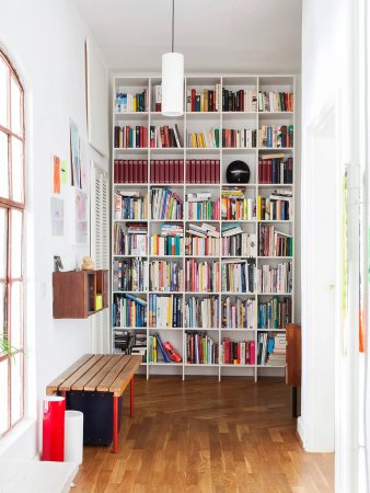 long bookcase at end of hallway