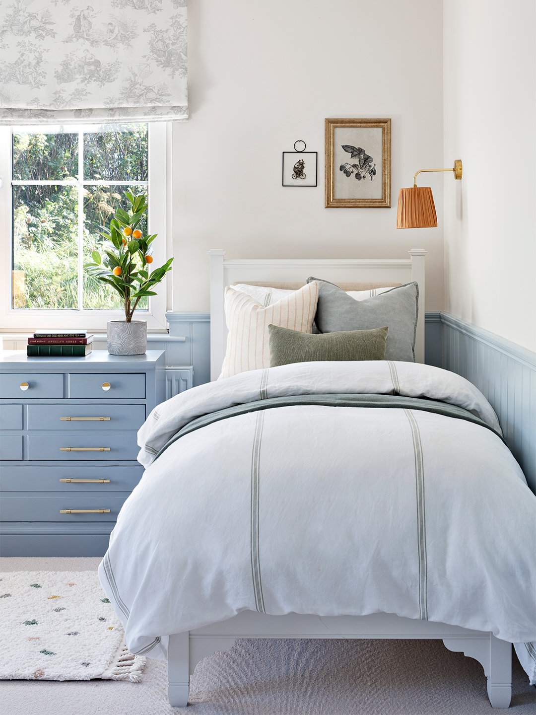 A blue and white bedroom