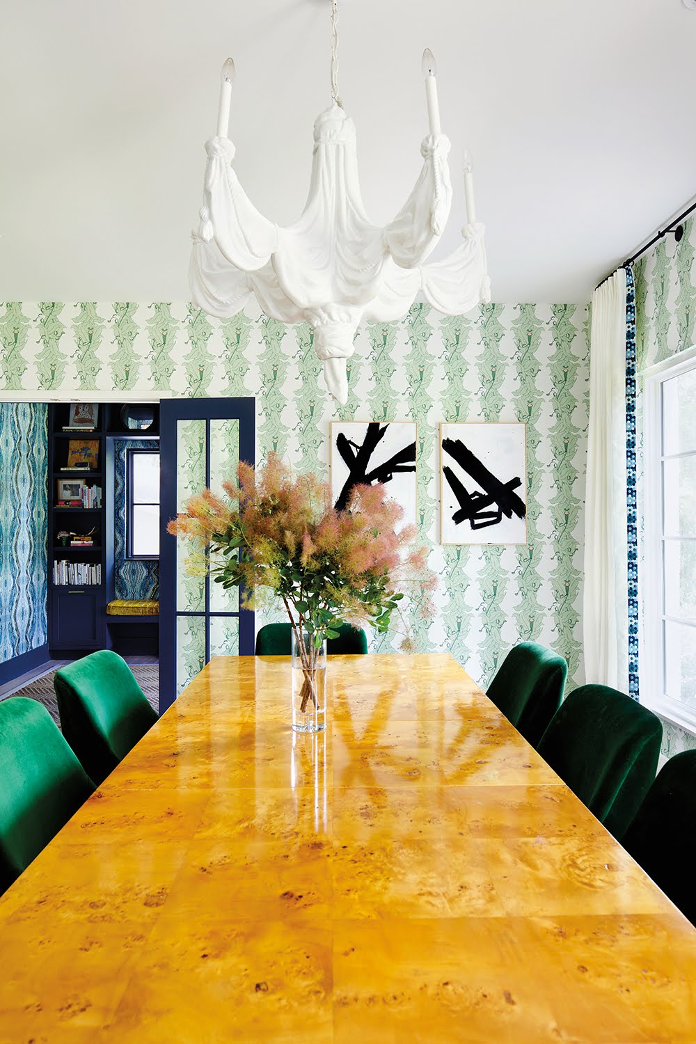 green wallpapered dining room