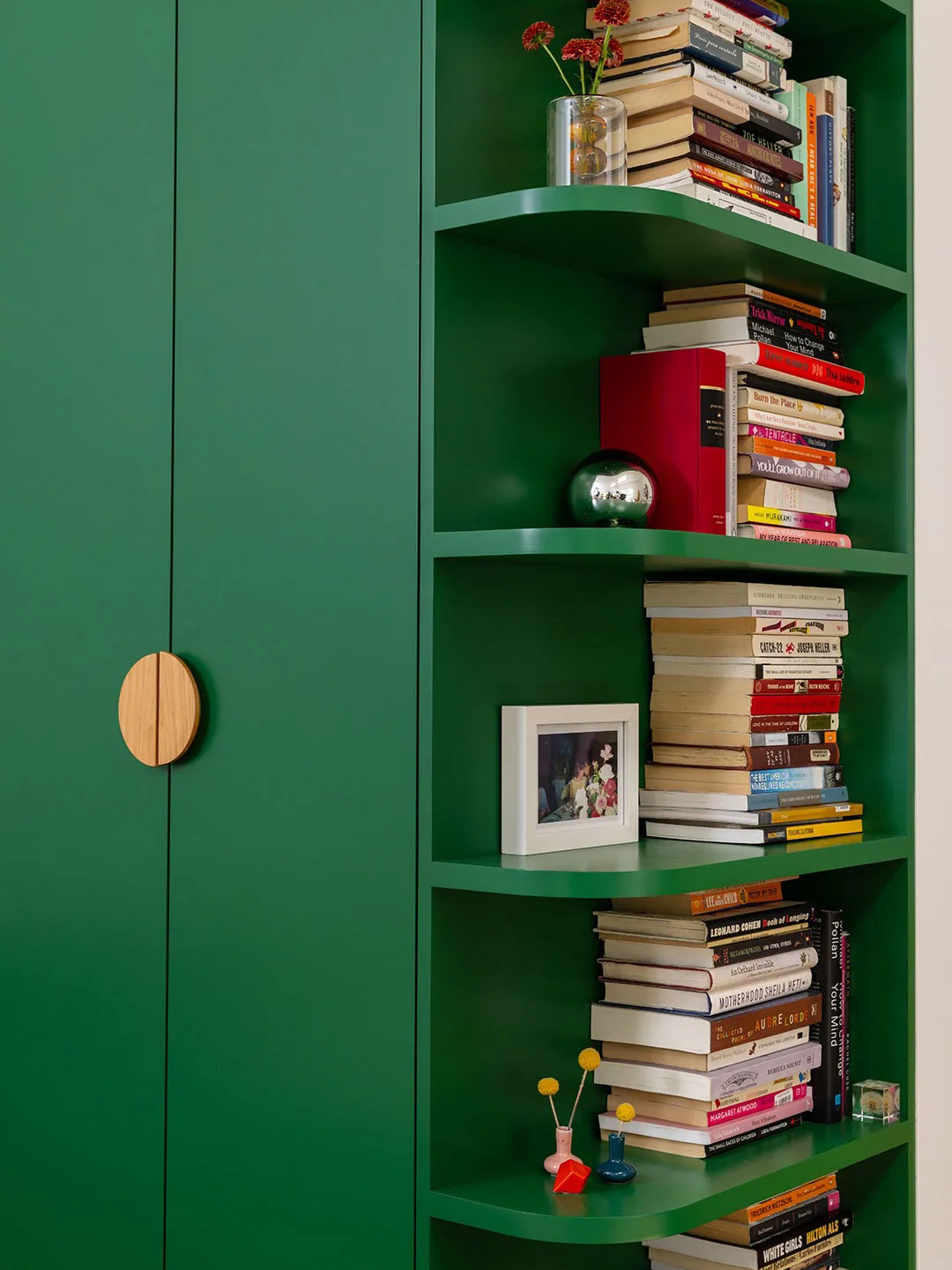 green bookshelves