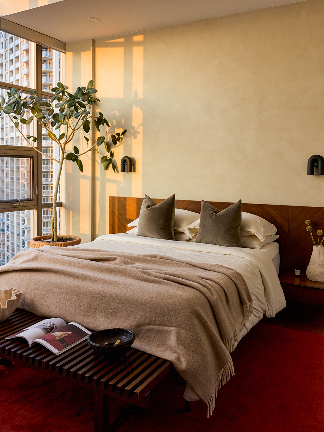 bed with red rug