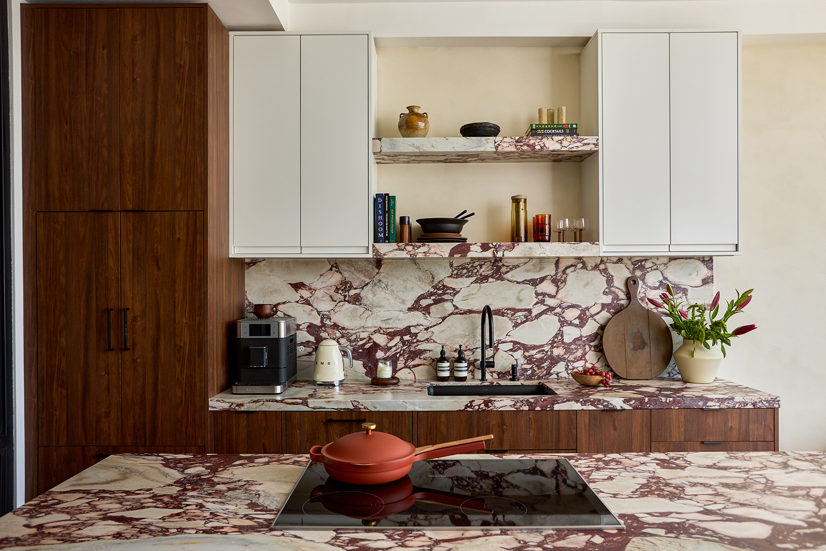 white kitchen with bold marble