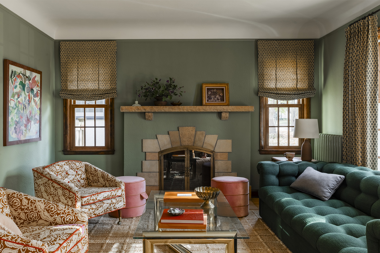 Living room with blue-green walls.