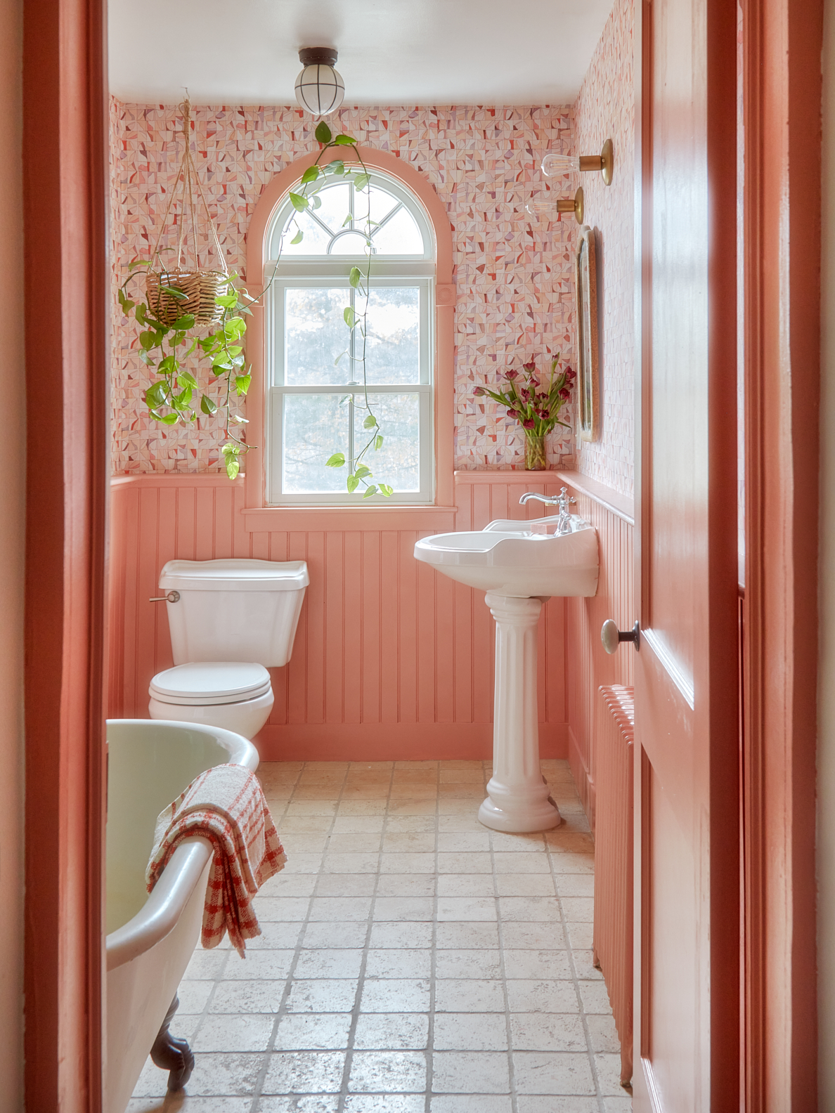 The main bathroom painted peach.