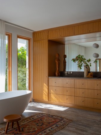 Bathroom with wood cabinets