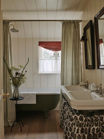 bathroom with sink skirt