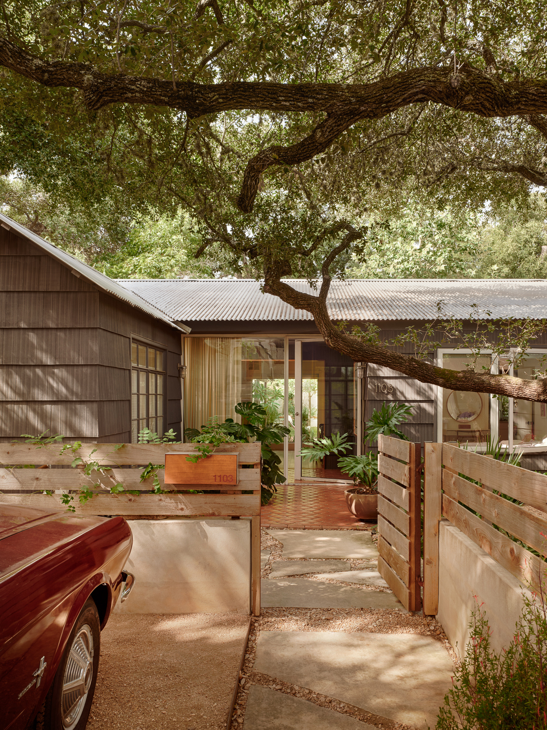 bungalow with large tree