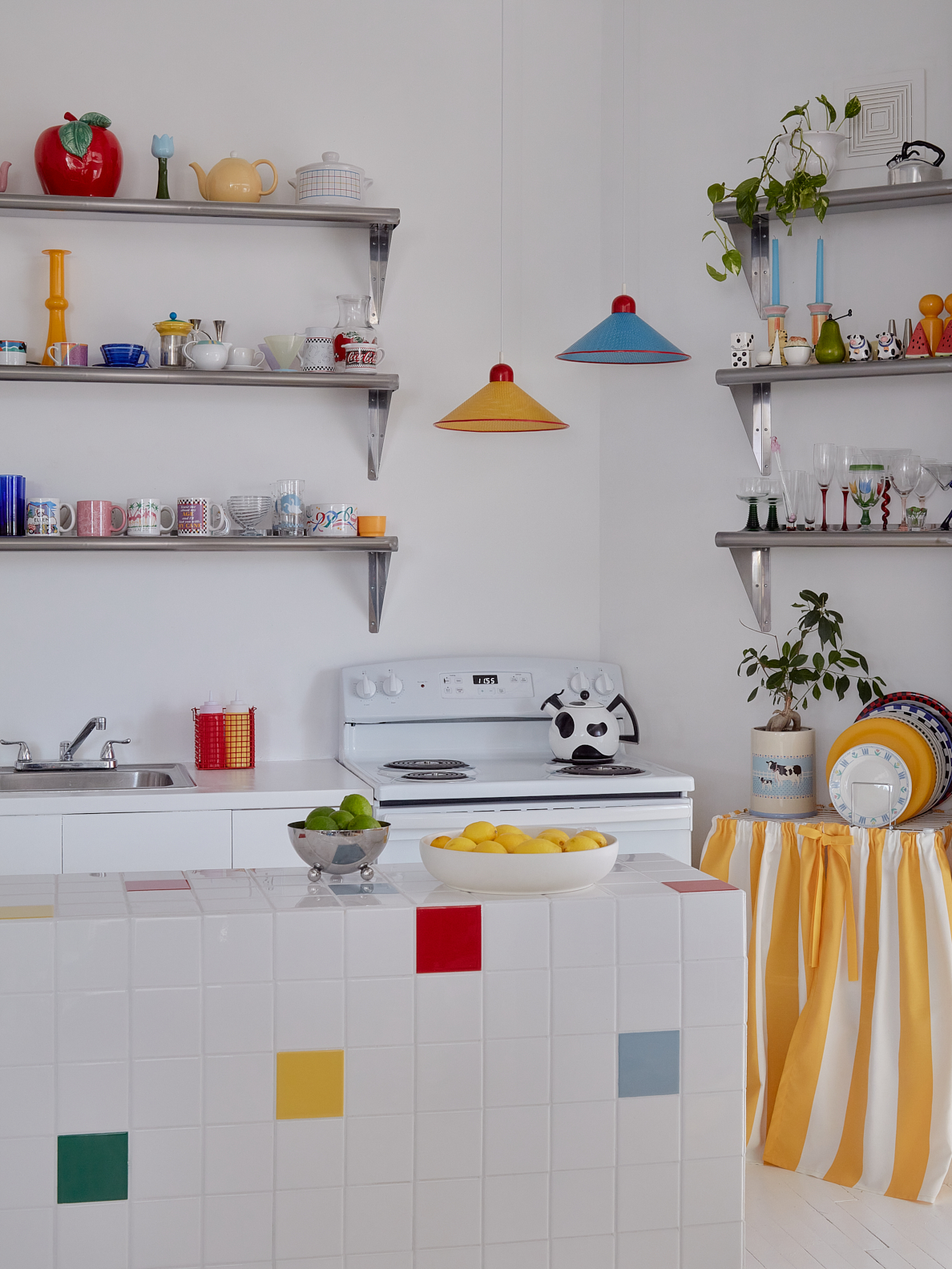 Kitchen island and wire rack with a striped skirt