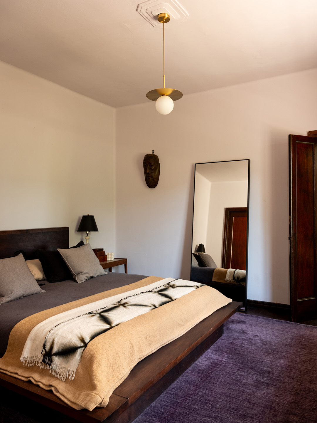 purple rug in bedroom